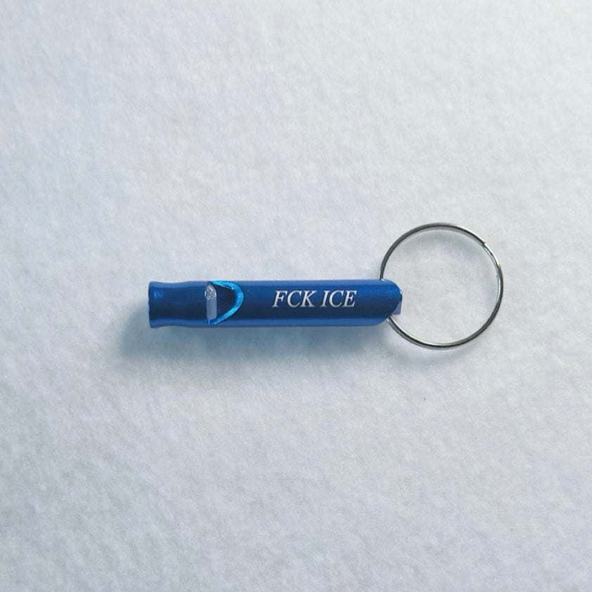 Blue cylindrical keychain with 'FCK ICE' text on a textured white background