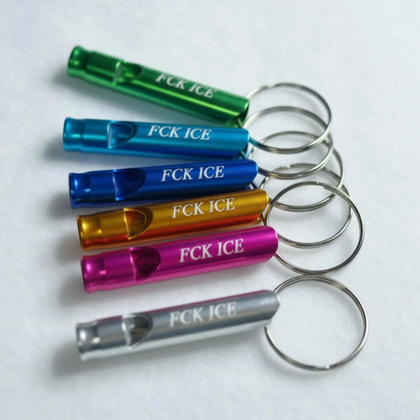 Aluminum Whistle Keychain Emergency Safety Tool Compact Design Metal Key Ring Functional Whistle Attachment Multiple Color Options Personal Security Device Portable Protection Accessory Durable Construction Lightweight Carry Option